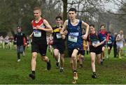 16 February 2022; Athletes, including David Wajrik of St Mary's CBS Portlaoise, left, and Jack Moloney of Naas CBS, competing in the minor boys' 2000m during the Irish Life Health Leinster Schools Cross Country Championships at Santry Demesne in Dublin. Photo by Sam Barnes/Sportsfile