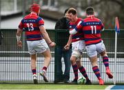 19 February 2022; Adrian D'Arcy of Clontarf, centre, celebrates with teammates Michael Courtney, left, and Cian O'Donogue after scoring their side's third try during the Energia All-Ireland League Division 1A match between Clontarf and Young Munster at Castle Avenue in Dublin. Photo by Sam Barnes/Sportsfile