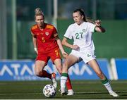 22 February 2022; Abbie Larkin of Republic of Ireland in action against Rhiannon Roberts of Wales during the Pinatar Cup Third Place Play-off match between Wales and Republic of Ireland at La Manga in Murcia, Spain. Photo by Silvestre Szpylma/Sportsfile