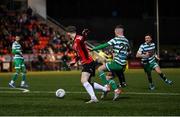 25 February 2022; Jamie McGonigle of Derry City is fouled by Jack Byrne of Shamrock Rovers, resulting in a penalty, during the SSE Airtricity League Premier Division match between Derry City and Shamrock Rovers at The Ryan McBride Brandywell Stadium in Derry. Photo by Stephen McCarthy/Sportsfile