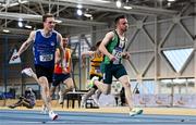 27 February 2022; Dean Adams of Ballymena and Antrim AC right on his way to winning, his senior men's 60m heat, ahead of Cillian Griffin of Tralee Harriers AC, Kerry, left,  during day two of the Irish Life Health National Senior Indoor Athletics Championships at the National Indoor Arena at the Sport Ireland Campus in Dublin. Photo by Sam Barnes/Sportsfile