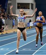 27 February 2022; Georgie Hartigan of Dundrum South Dublin AC, celebrates winning the senior women's 1500m during day two of the Irish Life Health National Senior Indoor Athletics Championships at the National Indoor Arena at the Sport Ireland Campus in Dublin. Photo by Sam Barnes/Sportsfile