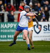 27 February 2022; Stephen Bennett of Waterford in action against David Kearney of Antrim during the Allianz Hurling League Division 1 Group B match between Antrim and Waterford at Corrigan Park in Belfast. Photo by Oliver McVeigh/Sportsfile