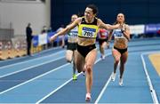 27 February 2022; Phil Healy of Bandon AC, Cork, dips for the line to win the senior women's 400m during day two of the Irish Life Health National Senior Indoor Athletics Championships at the National Indoor Arena at the Sport Ireland Campus in Dublin. Photo by Sam Barnes/Sportsfile