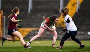 27 February 2022; Sinead Walsh of Mayo goes around Galway goalkeeper Alanah Griffin on her way to scoring her side's sixth goal during the Lidl Ladies Football National League Division 1 match between Galway and Mayo at Tuam Stadium in Galway. Photo by Ben McShane/Sportsfile