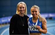 27 February 2022; Molly Scott of St Laurence O'Toole AC, Carlow, right, is congratulated by Olympian Derval O'Rourke after winning the senior women's 60m final in a national record time of 7.19, after the final had to be re-run during day two of the Irish Life Health National Senior Indoor Athletics Championships at the National Indoor Arena at the Sport Ireland Campus in Dublin. Photo by Sam Barnes/Sportsfile