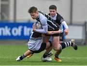 28 February 2022; Rob Carney of Cistercian College Roscrea is tackled by Jonathan Fardy of Newbridge College during the Bank of Ireland Leinster Rugby Schools Junior Cup 1st Round match between Newbridge College, Kildare, and Cistercian College, Roscrea, Tipperary, at Energia Park in Dublin. Photo by Brendan Moran/Sportsfile