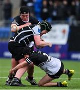 28 February 2022; Henry Maher of Cistercian College Roscrea is tackled by Mark Connolly of Newbridge College during the Bank of Ireland Leinster Rugby Schools Junior Cup 1st Round match between Newbridge College, Kildare, and Cistercian College, Roscrea, Tipperary, at Energia Park in Dublin. Photo by Brendan Moran/Sportsfile