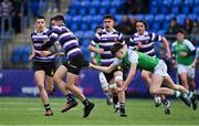 28 February 2022; Ethan Balamash of Terenure College is tackled by Bobby Colbert of Gonzaga College during the Bank of Ireland Leinster Rugby Schools Junior Cup 1st Round match between Terenure College, Dublin, and Gonzaga College, Dublin, at Energia Park in Dublin. Photo by Brendan Moran/Sportsfile
