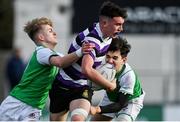 28 February 2022; Ben Blaney of Terenure College is tackled by Jamie Inglis, left, and Daragh O’Dwyer of Gonzaga College  during the Bank of Ireland Leinster Rugby Schools Junior Cup 1st Round match between Terenure College, Dublin, and Gonzaga College, Dublin, at Energia Park in Dublin. Photo by Brendan Moran/Sportsfile