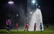 28 February 2022; Players leave the pitch after a sprinkler went off during the SSE Airtricity League Premier Division match between UCD and Shelbourne at UCD Bowl in Belfield, Dublin. Photo by Harry Murphy/Sportsfile