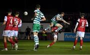 4 March 2022; Rory Gaffney of Shamrock Rovers has an attempt on target under pressure from Tom Grivosti of St Patrick's Athletic during the SSE Airtricity League Premier Division match between St Patrick's Athletic and Shamrock Rovers at Richmond Park in Dublin. Photo by Seb Daly/Sportsfile