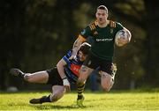 6 March 2022; Jack Mitchell of Boyne on his way to scoring his side's third try despite the tackle of Richie Waters of Wexford Wanderers during the Bank of Ireland Leinster Rugby Provincial Towns Cup 1st Round match between Wexford Wanderers RFC and Boyne RFC at Wexford Wanderers RFC in Wexford. Photo by Harry Murphy/Sportsfile