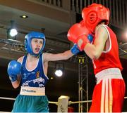 2 August 2013; Sean Whelan, left, Ireland, exchanges punches with Dzmitry Herasimau, Belarus, during their 43Kg bout. 2013 EUBC European Schoolboys Boxing Championships Semi-Finals, Citywest Hotel, Saggart, Co. Dublin. Picture credit: Barry Cregg / SPORTSFILE
