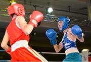 2 August 2013; Sean Whelan, left, Ireland, exchanges punches with Dzmitry Herasimau, Belarus, during their 43kg bout. 2013 EUBC European Schoolboys Boxing Championships Semi-Finals, Citywest Hotel, Saggart, Co. Dublin. Picture credit: Barry Cregg / SPORTSFILE