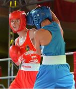 2 August 2013; Jamie Harty, left, Ireland, exchanges punches with Oleksandr Kravets, Ukraine, during their 48kg bout. 2013 EUBC European Schoolboys Boxing Championships Semi-Finals, Citywest Hotel, Saggart, Co. Dublin. Picture credit: Barry Cregg / SPORTSFILE