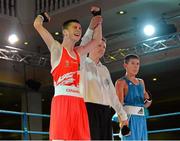 2 August 2013; Jamie Harty, left, Ireland, celebrates as he is declared the winner over Oleksandr Kravets, Ukraine, in their 48kg bout. 2013 EUBC European Schoolboys Boxing Championships Semi-Finals, Citywest Hotel, Saggart, Co. Dublin. Picture credit: Barry Cregg / SPORTSFILE