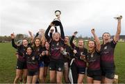 8 March 2022; Mercy Secondary School captain Fiona Dixon lifts the cup as her teammates celebrate after Leinster Rugby Midlands X7s final match between Mercy Secondary School, Kilbeggan and Sacred Heart School, Tullamore at Birr RFC in Birr, Offaly. Photo by Matt Browne/Sportsfile