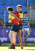 10 March 2022; Ryan Curley of St Fintan’s High School, left, celebrates after scoring his side's second try with teammate Michael Bolger during the Bank of Ireland Leinster Rugby Schools Junior Cup 2nd Round match between St Gerards School and St Fintans High School at Energia Park in Dublin. Photo by Harry Murphy/Sportsfile