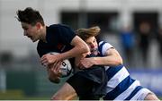 10 March 2022; Charlie Hempenstall of Wesley College is tackled by Johnny O'Sullivan of Blackrock College during the Bank of Ireland Leinster Rugby Schools Junior Cup 2nd Round match between Blackrock College and Wesley College at Energia Park in Dublin. Photo by Harry Murphy/Sportsfile