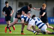 10 March 2022; Joe Cullen of Wesley College is tackled by Cian O'Connell of Blackrock College during the Bank of Ireland Leinster Rugby Schools Junior Cup 2nd Round match between Blackrock College and Wesley College at Energia Park in Dublin. Photo by Harry Murphy/Sportsfile