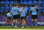 11 March 2022; Luke Kilmurray of St Michaels College, centre, and Daniel Ryan embrace after their side's victory in the Bank of Ireland Leinster Schools Junior Cup 2nd Round match between Terenure College and St Michaels College at Energia Park in Dublin. Photo by Harry Murphy/Sportsfile