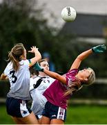 11 March 2022; Lauren McGregor of NUIG in action against Siofra Ni Chonnaill of UL during the Yoplait LGFA O'Connor Cup Semi-Final match between UL, Limerick and NUIG, Galway at DCU Dóchas Éireann Astro Pitch in Dublin. Photo by Eóin Noonan/Sportsfile