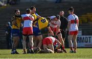 13 March 2022; Players tussle off the ball during the Allianz Football League Division 2 match between Roscommon and Derry at Dr Hyde Park in Roscommon. Photo by Piaras Ó Mídheach/Sportsfile