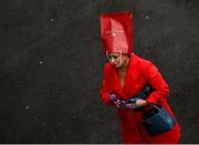 16 March 2022; A racegoer arrives for day two of the Cheltenham Racing Festival at Prestbury Park in Cheltenham, England. Photo by David Fitzgerald/Sportsfile