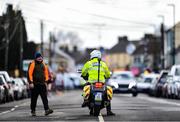 17 March 2022; A member of An Garda Síochána in conversation with a steward before the Kia Race Series 5k of Portlaoise in Laois. Photo by Ben McShane/Sportsfile