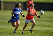 19 March 2022; Aoife McCoy of Armagh in action against Amy Potts of Laois during the Lidl Ladies Football National League Division 2 Semi-Final match between Armagh and Laois at O'Raghallaigh's GAA Club in Drogheda, Louth. Photo by Oliver McVeigh/Sportsfile