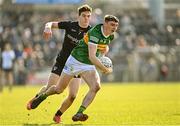 20 March 2022; Diarmuid O'Connor of Kerry in action against Jarly Óg Burns of Armagh during the Allianz Football League Division 1 match between Armagh and Kerry at the Athletic Grounds in Armagh. Photo by Ramsey Cardy/Sportsfile