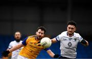 20 March 2022; Mark Hughes of Longford in action against Malachy Stone of Wicklow during the Allianz Football League Division 3 match between Longford and Wicklow at Glennon Brothers Pearse Park in Longford. Photo by Philip Fitzpatrick/Sportsfile