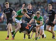 20 March 2022; Andrew Murnin of Armagh is tackled by Adrian Spillane, left, and Stephen O'Brien of Kerry during the Allianz Football League Division 1 match between Armagh and Kerry at the Athletic Grounds in Armagh. Photo by Ramsey Cardy/Sportsfile