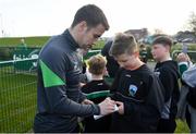 28 March 2022; Seamus Coleman signs autographs for players from Mourne Celtic, Drimnagh, after a Republic of Ireland training session at FAI National Training Centre in Dublin. Photo by Eóin Noonan/Sportsfile
