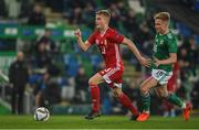29 March 2022; András Schäfer of Hungary in action against Alistair McCann of Northern Ireland during the international friendly match between Northern Ireland and Hungary at National Football Stadium at Windsor Park in Belfast. Photo by Ramsey Cardy/Sportsfile