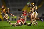 26 March 2022; Jack O'Connor of Cork handpasses the ball under pressure from Kilkenny players Paddy Deegan and Richie Reid, behind, during the Allianz Hurling League Division 1 Semi-Final match between Cork and Kilkenny at Páirc Ui Chaoimh in Cork. Photo by Piaras Ó Mídheach/Sportsfile
