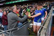 3 April 2022; David Clifford of Kerry is congratulated by RTÉ presenter Dáithí Ó Sé after the Allianz Football League Division 1 Final match between Kerry and Mayo at Croke Park in Dublin. Photo by Eóin Noonan/Sportsfile