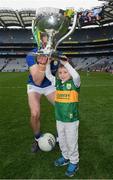 3 April 2022; Five year old Paidi lifts the cup with his father Paul Geaney of Kerry after the Allianz Football League Division 1 Final match between Kerry and Mayo at Croke Park in Dublin. Photo by Ray McManus/Sportsfile