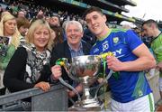 3 April 2022; Kerry captain Joe O'Connor with his parents Helen and Jim with the cup after the Allianz Football League Division 1 Final match between Kerry and Mayo at Croke Park in Dublin. Photo by Ray McManus/Sportsfile