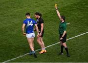 3 April 2022; Referee Noel Mooney shows the yellow card to both David Clifford of Kerry and Pádraig O'Hora of Mayo during the Allianz Football League Division 1 Final match between Kerry and Mayo at Croke Park in Dublin. Photo by Piaras Ó Mídheach/Sportsfile