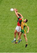 4 August 2013; Aidan O'Shea, Mayo, in action against Ryan Bradley, Donegal. GAA Football All-Ireland Senior Championship, Quarter-Final, Mayo v Donegal, Croke Park, Dublin. Picture credit: Dáire Brennan / SPORTSFILE