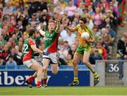 4 August 2013; Rory Kavanagh, Donegal, in action against Chris Barrett, left, and Donal Vaughan, Mayo. GAA Football All-Ireland Senior Championship, Quarter-Final, Mayo v Donegal, Croke Park, Dublin. Picture credit: Ray McManus / SPORTSFILE