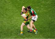 4 August 2013; Mark McHugh, Donegal, in action against Kevin McLoughlin, Mayo. GAA Football All-Ireland Senior Championship, Quarter-Final, Mayo v Donegal, Croke Park, Dublin. Picture credit: Dáire Brennan / SPORTSFILE