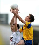 5 August 2013; Eoin Fallon, Roscommon, in action against Cein NcMonagle, Kildare. Electric Ireland GAA Football All-Ireland Minor Championship Quarter-Final, Kildare v Roscommon, O'Connor Park, Tullamore, Co. Offaly. Picture credit: David Maher / SPORTSFILE