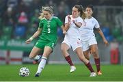 12 April 2022; Simone Magill of Northern Ireland in action against Ella Ann Toone of England during the FIFA Women's World Cup 2023 qualifier match between Northern Ireland and England at National Stadium at Windsor Park in Belfast. Photo by Ramsey Cardy/Sportsfile