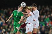 12 April 2022; Sarah McFadden of Northern Ireland in action against England players Millie Bright, centre, and Lucy Bronze during the FIFA Women's World Cup 2023 qualifier match between Northern Ireland and England at National Stadium at Windsor Park in Belfast. Photo by Ramsey Cardy/Sportsfile