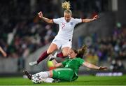 12 April 2022; Beth Mead of England is tackled by Sarah McFadden of Northern Ireland during the FIFA Women's World Cup 2023 qualifier match between Northern Ireland and England at National Stadium at Windsor Park in Belfast. Photo by Ramsey Cardy/Sportsfile