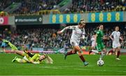 12 April 2022; Lauren Hemp of England gets around Northern Ireland goalkeeper Jacqueline Burns on her way to scoring her side's third goal during the FIFA Women's World Cup 2023 qualifier match between Northern Ireland and England at National Stadium at Windsor Park in Belfast. Photo by Ramsey Cardy/Sportsfile