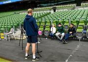 14 April 2022; Adam Reddington and his family were guests of Leinster Rugby at today’s Captain’s Run, Adam was introduced to Leinster Rugby by the Make-A-Wish charity and Adam and his family will be guests of Leinster Rugby and RTÉ at the Heineken Champions Cup game as he sees behind the scenes from a team and broadcast point of view, pictured is Head coach Leo Cullen being interviewed by Adam and his siblings, Tom Óg and Alannah, at the Aviva Stadium in Dublin.  Photo by Harry Murphy/Sportsfile